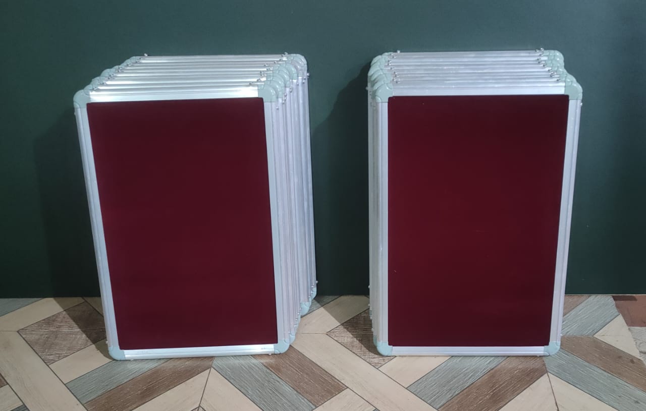 Evershine cloth-covered notice and pin board in red, green and blue fabric